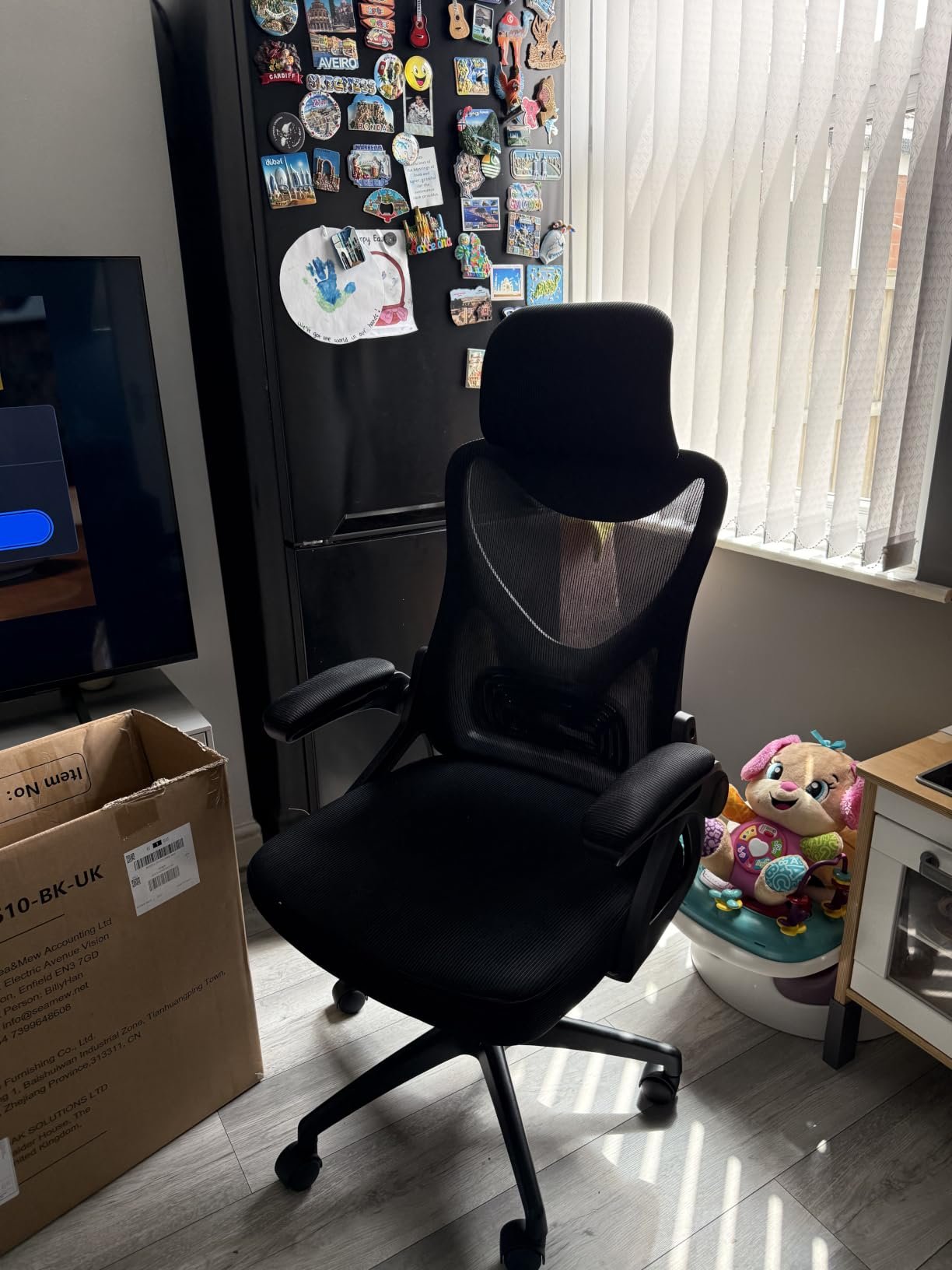Customer photo of the chair in a compact office